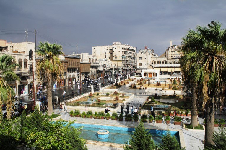 The sky over the skyline of Aleppo looked threatening.