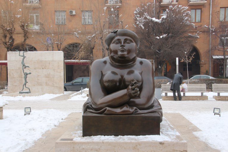 Sculpture smoking woman
