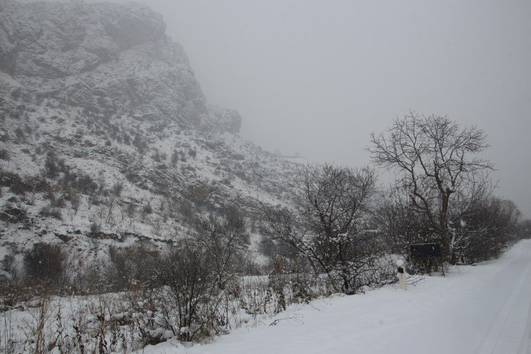 The small dot on the mountain is Noravank