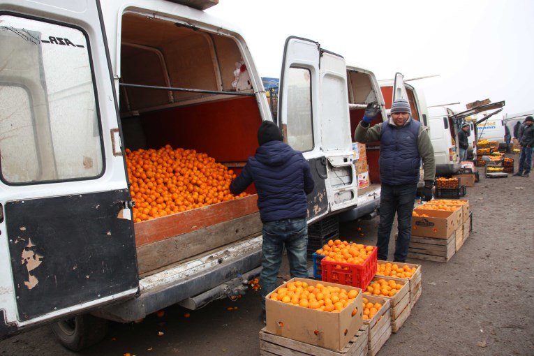 Right after the border of Georgia and Armenia our driver bought loads of mandarin fruit